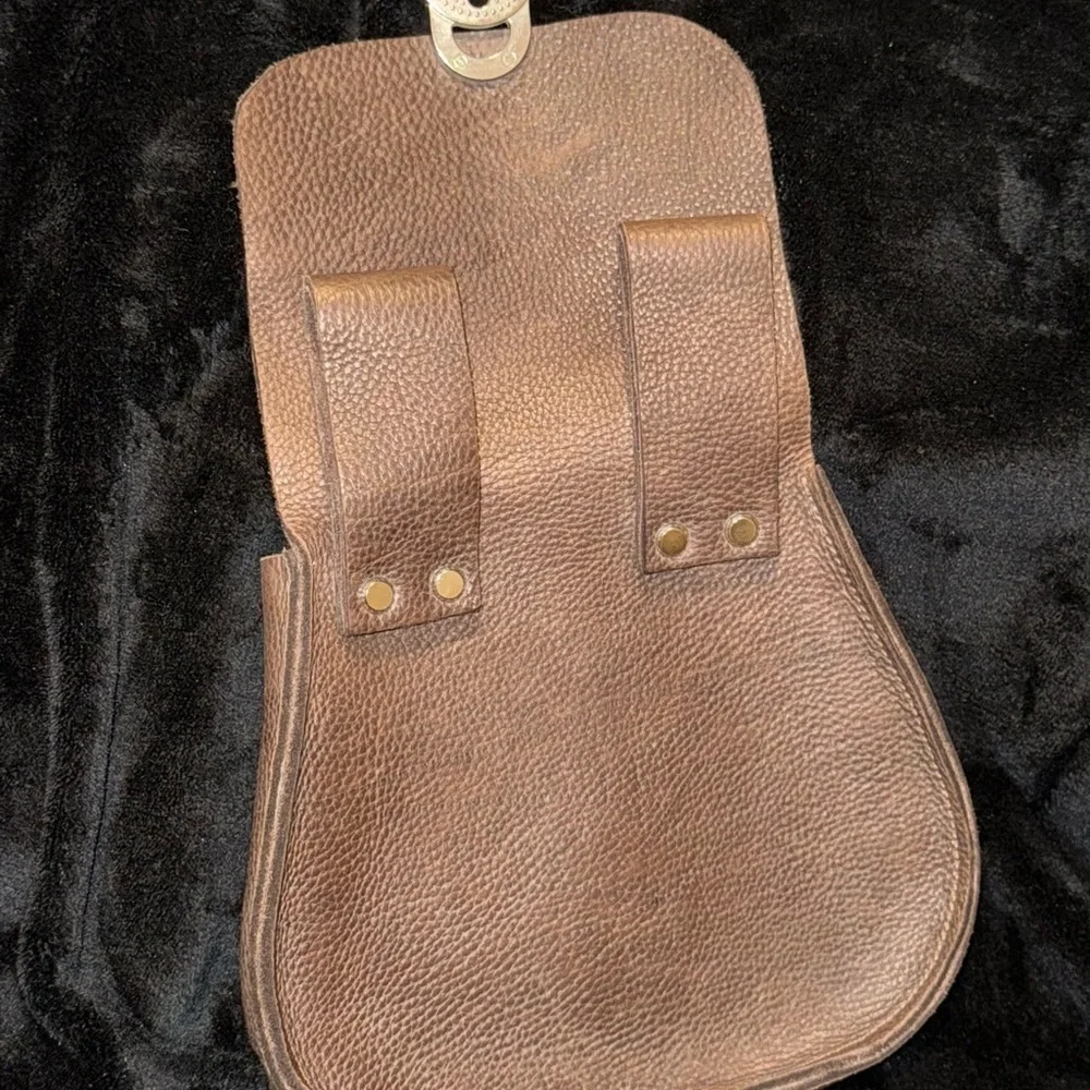 Brown Leather Backpack with Classic Design and Flap Closure